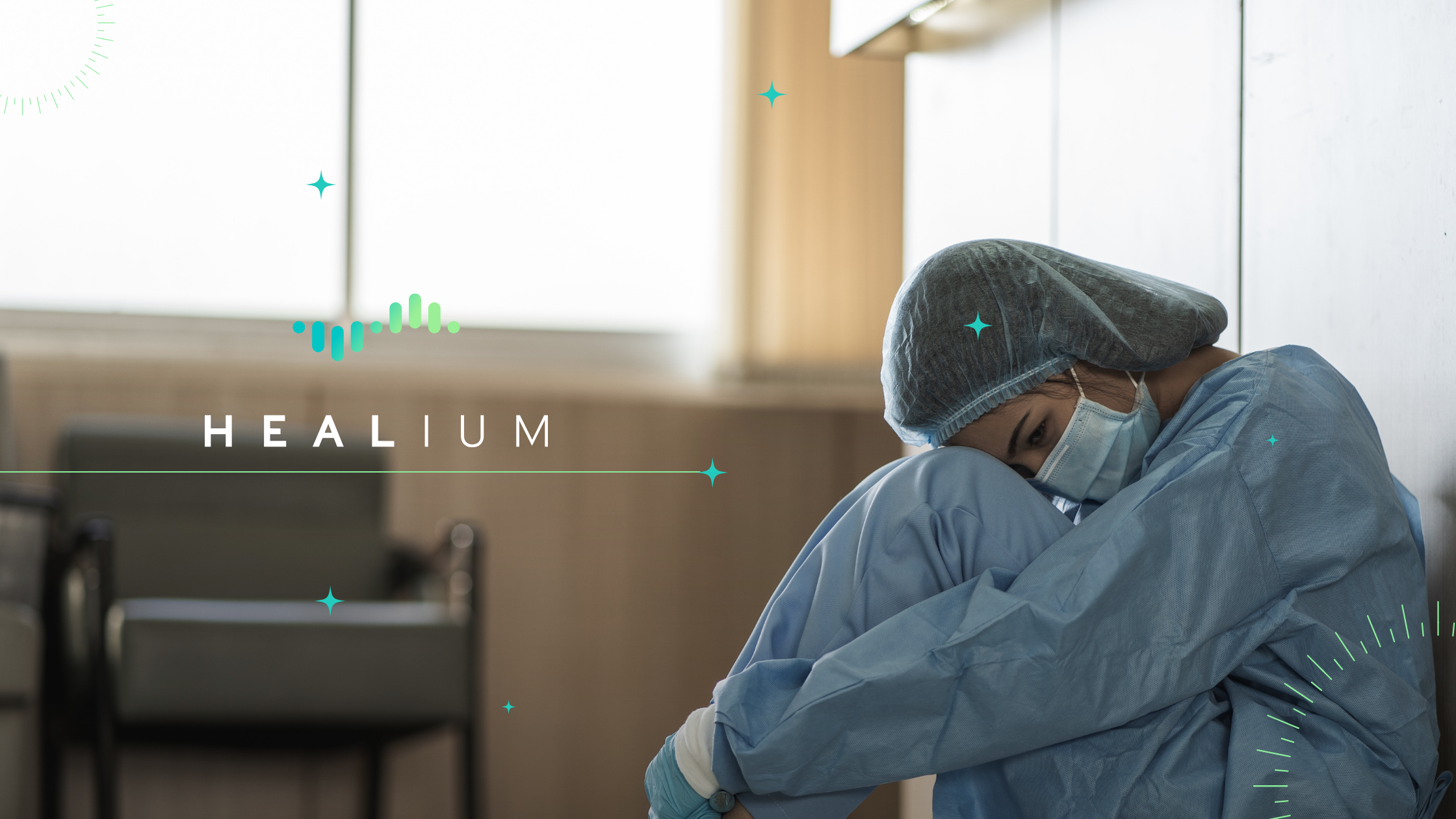 A healthcare staff member sits on the floor, exhausted. The Healium logo is to her left.