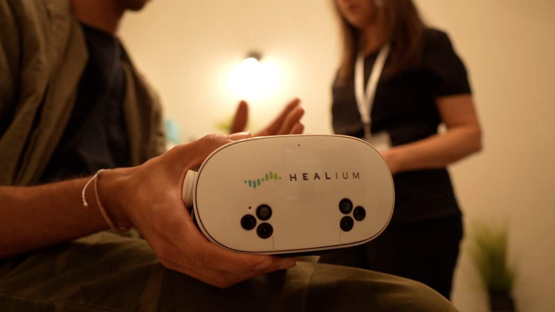 Healium held, patient clinician in background