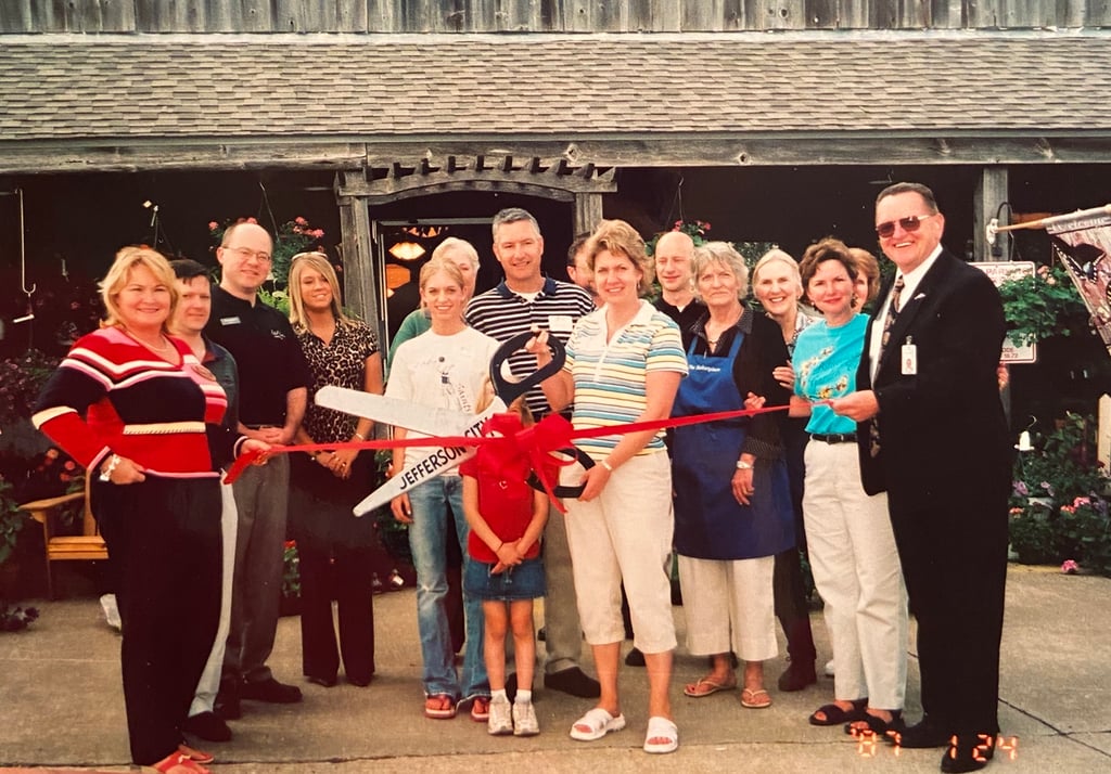 Helen Fisher and family at a ribbon cutting for her business