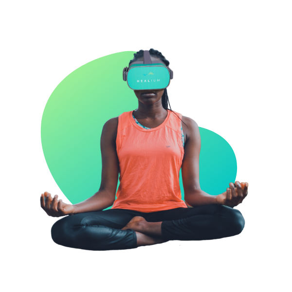 woman sitting cross legged with vr goggles