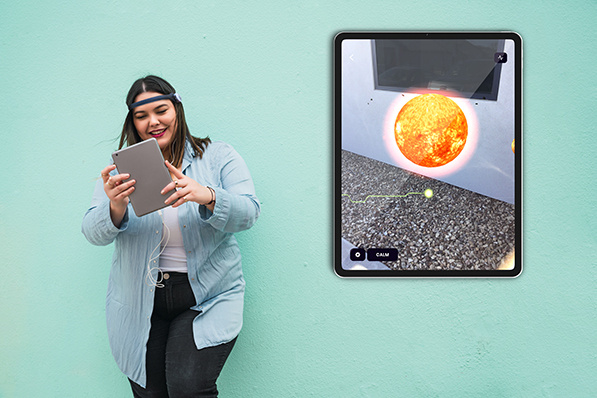 woman with BrainLink on ipad using Healium