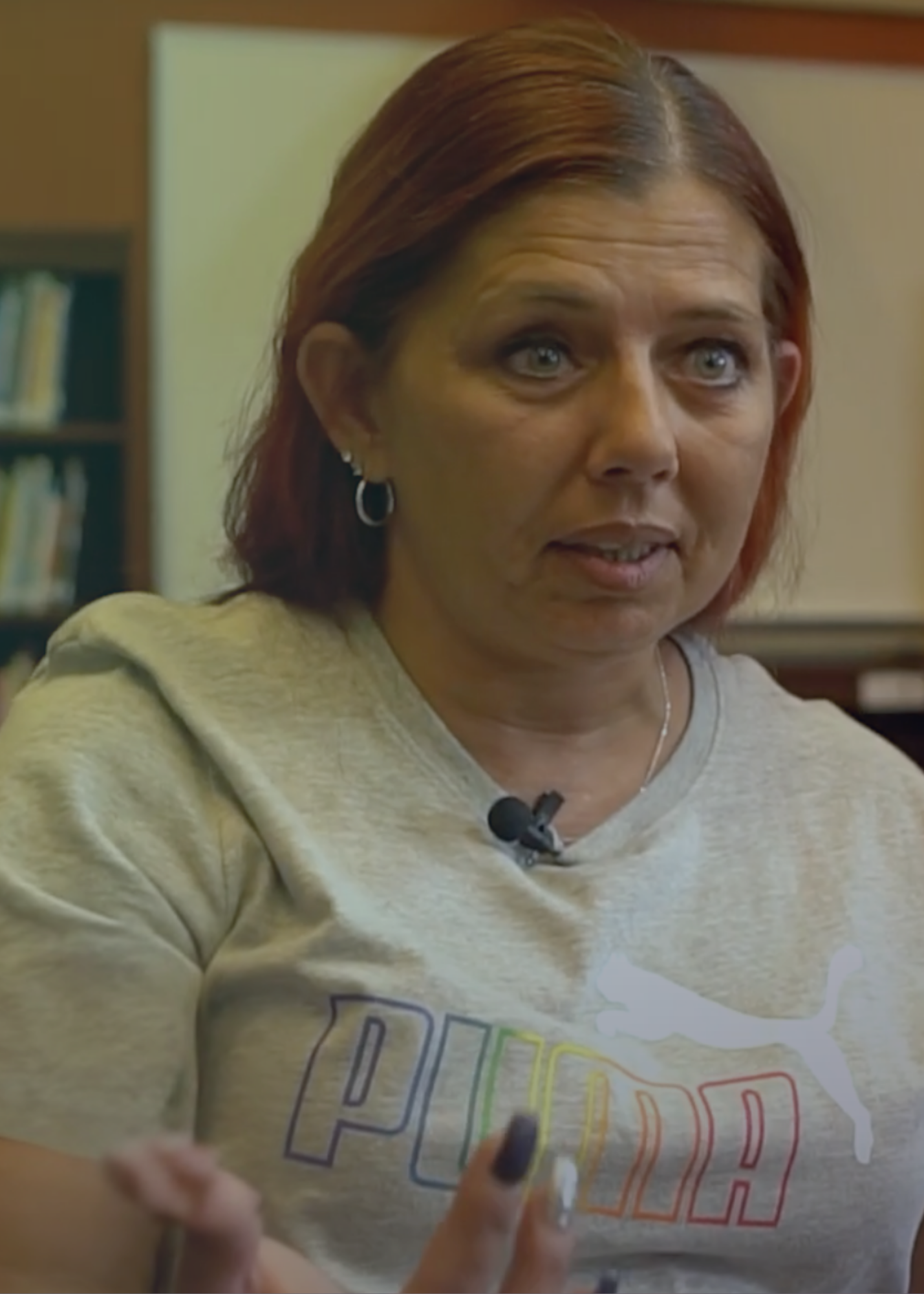 Justice's mom, Michelle, speaking towards the camera