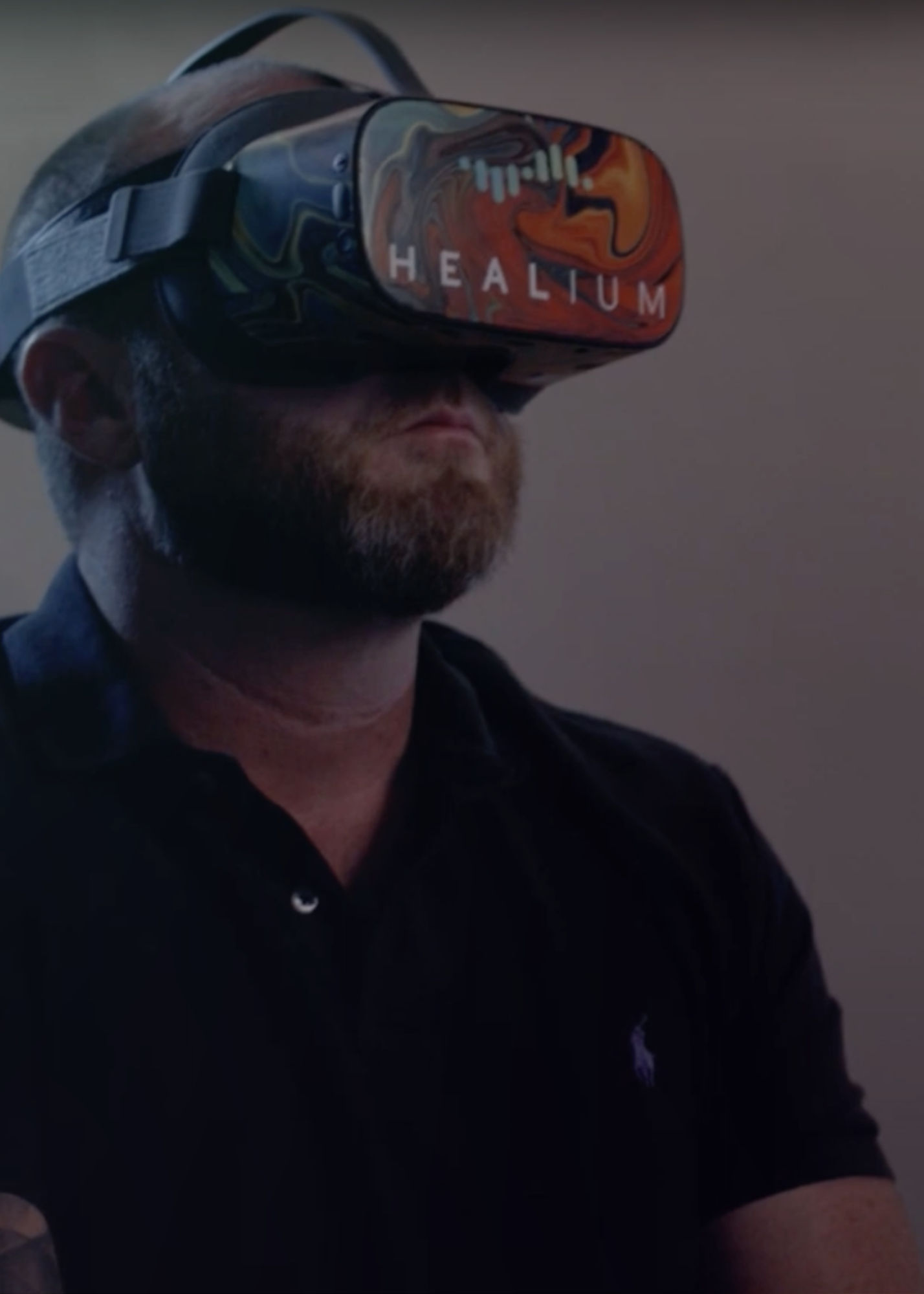 Terry Roberts wears Healium VR Goggles, looking relaxed.